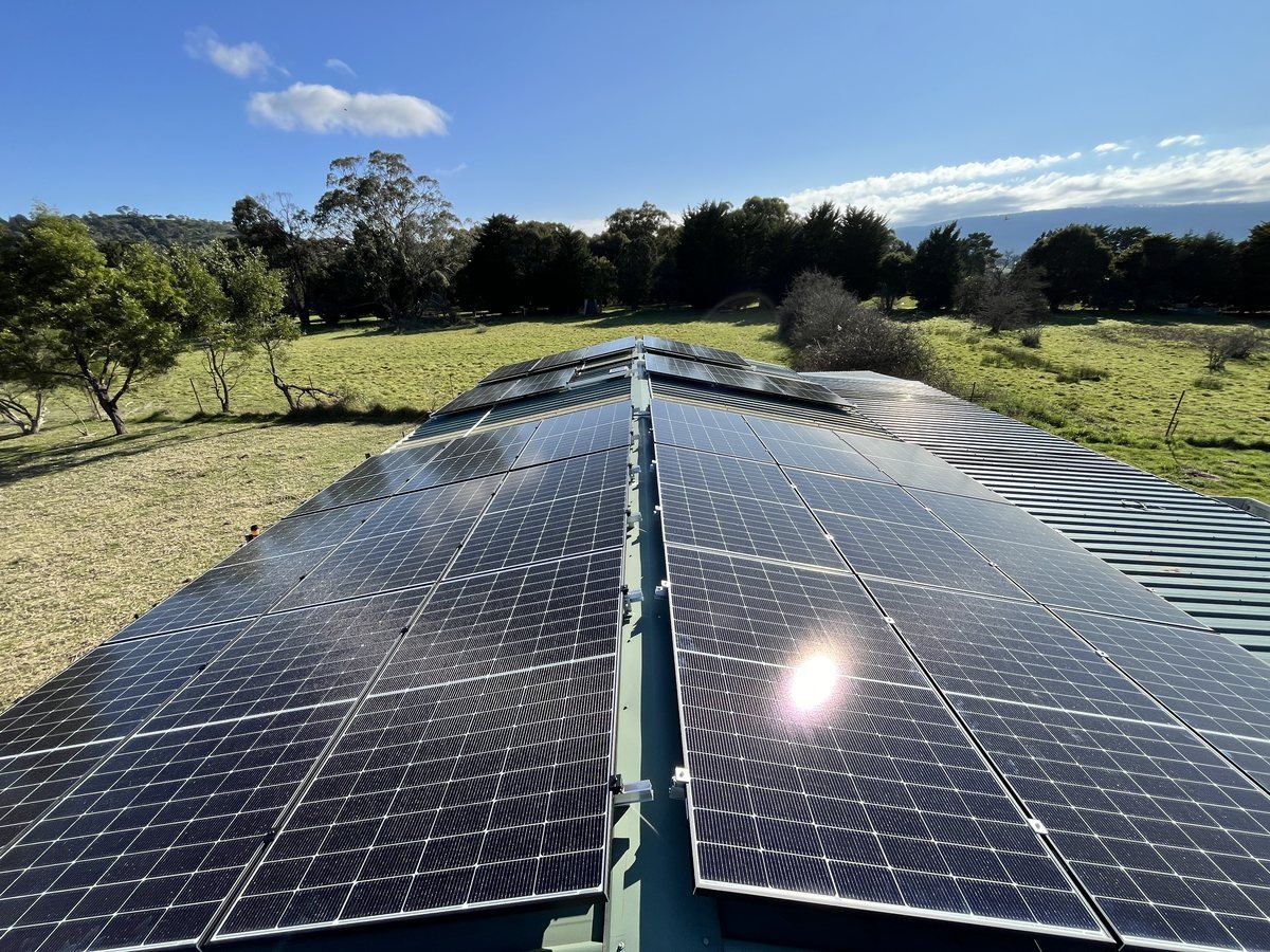 Solar panel array installed on a metal roof